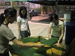 Ben, Ann and Myao preparing Banana Leaves